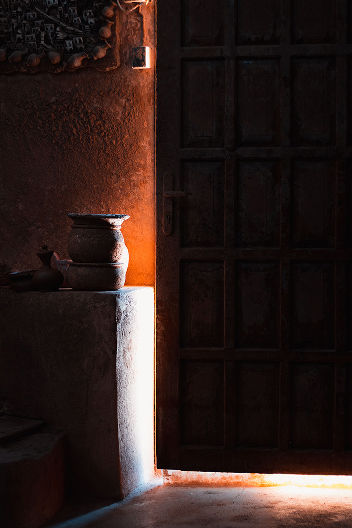 Light coming into the house through a door ajar